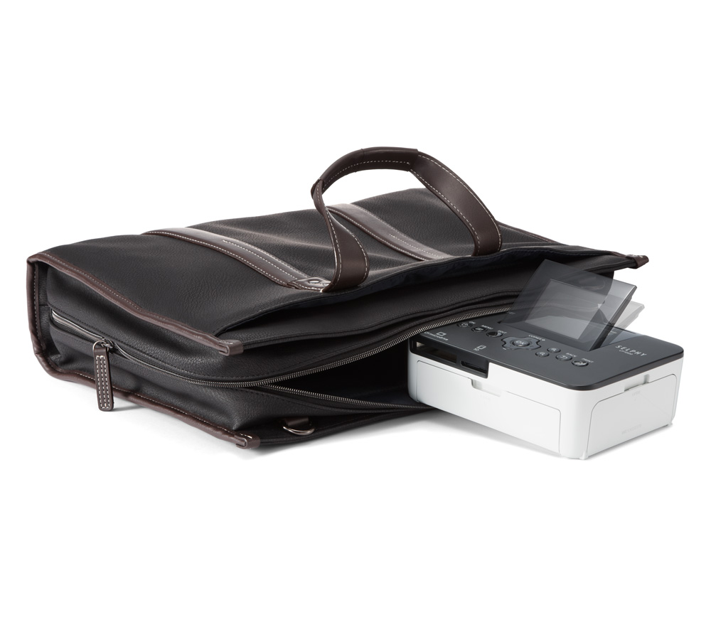 Фотопринтер Canon Selphy CP1000 черный с белым